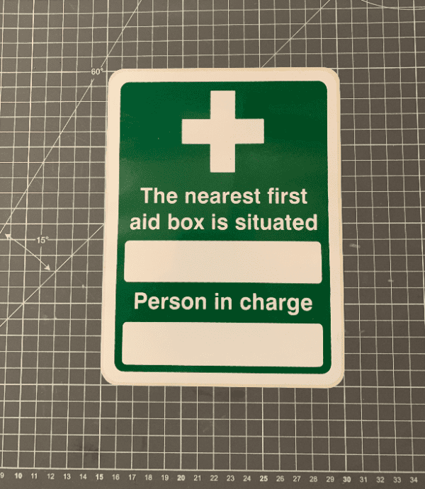 Nearest first aid box sign