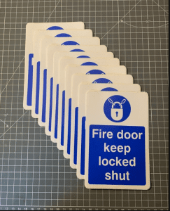 Fire Door Keep Locked Shut Sign - 100x150mm, self adhesive