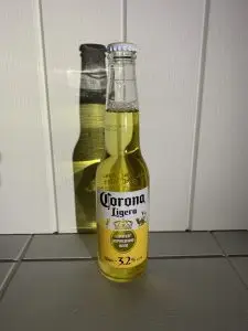 A full bottle of Corona Ligera.