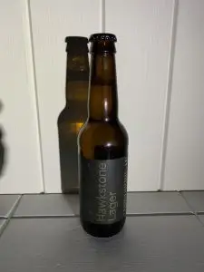 A full 330ml bottle of Hawkstone Lager