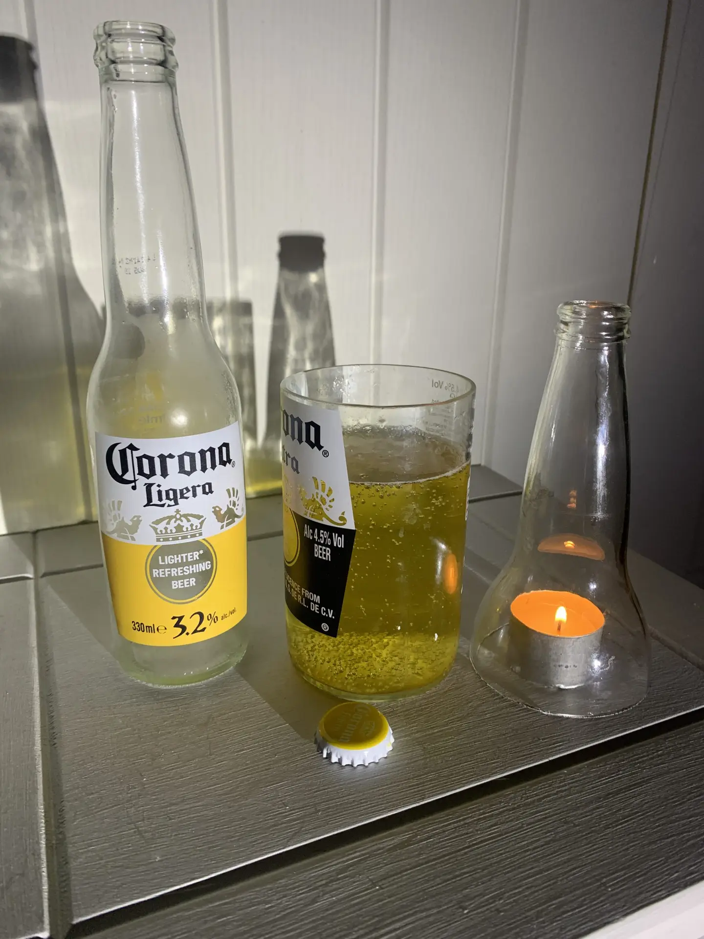 beer-glass-candle-cut-from-corona-bottle Beer glass and candle holder cut from Corona bottle.