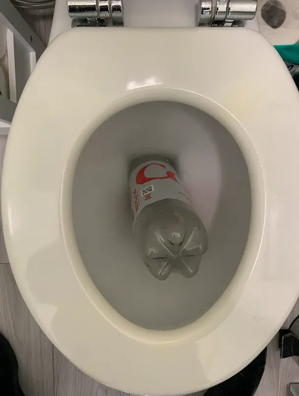 coke-bottle-toilet-plunger Coke bottle toilet plunger