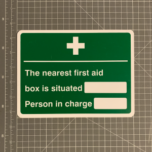 Nearest first aid box sign.