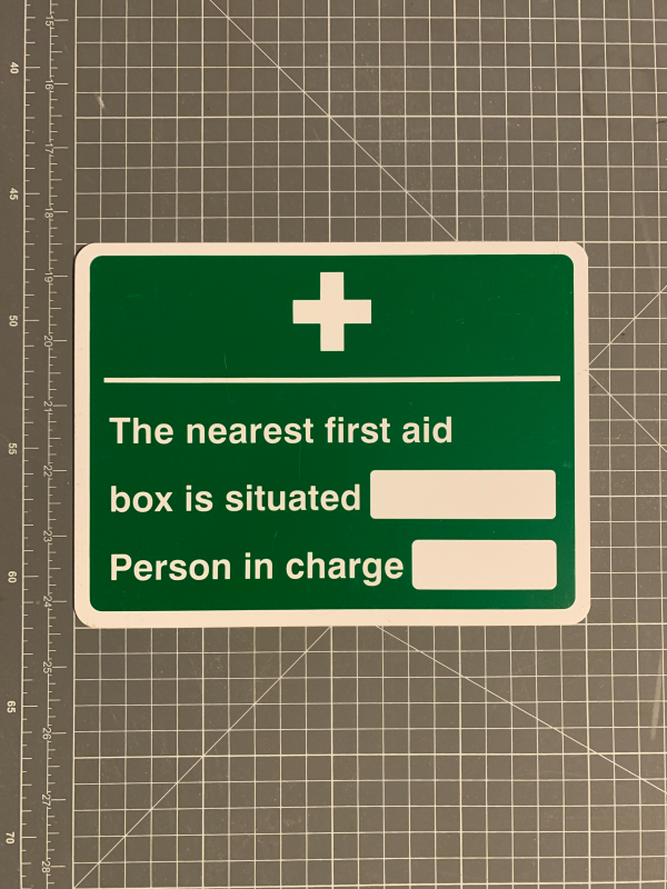 Nearest first aid box sign.