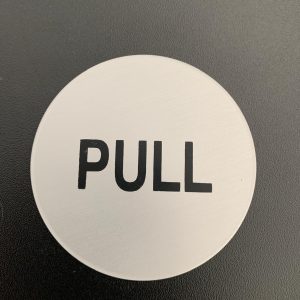 Brushed silver pull sign.