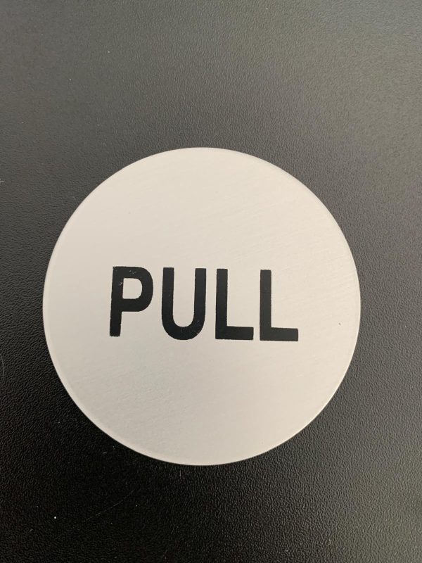 Brushed silver pull sign.